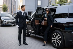 Executive stepping into a black car for corporate transportation in Everett